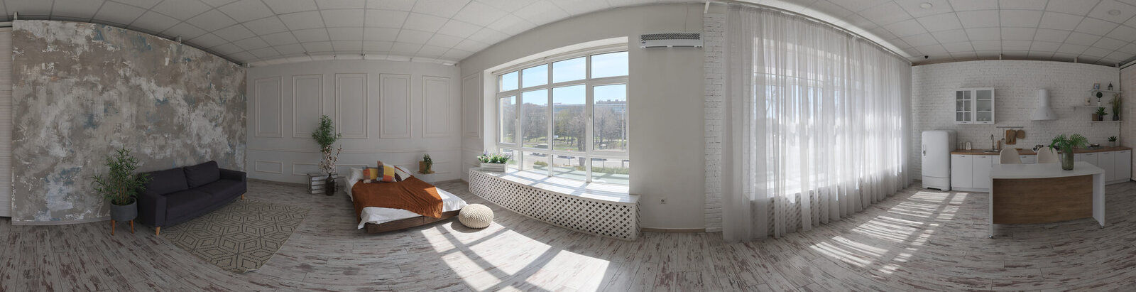 A bedroom with a large window and three plants tagged: a monstera, a peace lily, and an orchid.